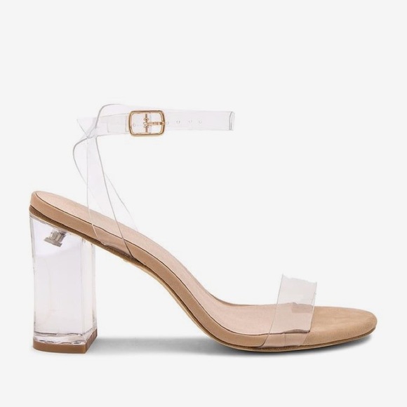 clear heels revolve